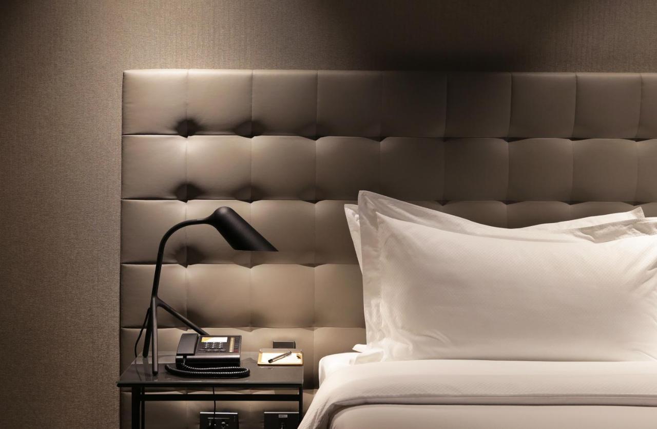 Makati Diamond Residences Makati City Exterior photo A bed with a headboard